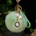 Faux Fur Pom Pom Keychain Collection With Pearl and Floral Charms view 7