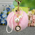 Faux Fur Pom Pom Keychain Collection With Pearl and Floral Charms view 11