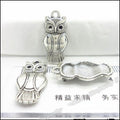 Long Owl Pendant with Recessed Wing Panels in Four Finishes view 4