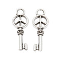 Peace Sign Skeleton Key Charm In Antique Bronze and Antique Silver Metal Finish view 4