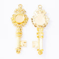 Ornate Key Shaped Round Bezel Settings in Three Finishes view 4