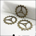 Three-Spoke Gear Metal Charms in Five Finish Options view 4