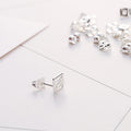 Korean 50 Pairs Boxed Mixed Tiny Studs With Hollow Flowers Stars Hearts Alloy Rhinestone Earrings view 3
