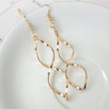 Elegant Minimalist Alloy Spiral Wave Curve Drop Stud Earrings for Women European American Style Earrings view 2