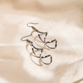 Elegant Minimalist Alloy Spiral Wave Curve Drop Stud Earrings for Women European American Style Earrings view 4