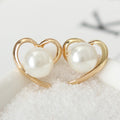 Elegant Korean Gold Tone Alloy Heart Studs With Faux Pearl Smooth Minimalist Women's Fashion Earrings view 2