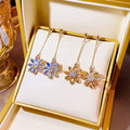 Luxury Iridescent Zircon Flower Long Drop Stud Earrings For Women Sparkling Alloy Floral Dangle Earrings view 1