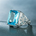Hollow Relief Carved Floral Pave Zircon Ring With Oversized Aquamarine Blue Stone Finger Jewelry view 3