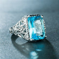 Hollow Relief Carved Floral Pave Zircon Ring With Oversized Aquamarine Blue Stone Finger Jewelry view 4
