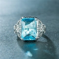 Hollow Relief Carved Floral Pave Zircon Ring With Oversized Aquamarine Blue Stone Finger Jewelry view 2