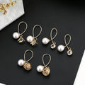 Elegant Korean Style Pearl Zircon Hollow Wire Ball Geometric Gold Alloy Loop Drop Earrings view 1