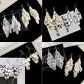 European Exaggerated Long Hollow Leaf Heart Earrings Matte Round Disc Tassel Drop Earrings view 1