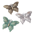 Double Loop Butterfly Connector Charms in Three Finishes view 5