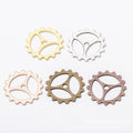 Three-Spoke Gear Metal Charms in Five Finish Options view 5