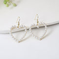 Elegant Vintage Faux Pearl Alloy Hollow Heart Drop Clip On Earrings For Women Korean Chic Geometric Earrings view 2