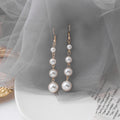 Elegant Gold Tone Alloy Long Tassel Drops, Round Hoop And Graduated Faux Pearl Dangle Earrings view 2
