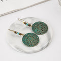 Vintage Ethnic Antique Bronze Alloy Hollow Round Filigree Turquoise Beaded Bohemian Drop Earrings view 4
