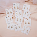 Elegant Asymmetric Star Moon Pearl Drop Studs Gold Alloy Rhinestone Zircon 925 Silver Needle Earrings view 2