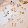 Elegant Asymmetric Star Moon Pearl Drop Studs Gold Alloy Rhinestone Zircon 925 Silver Needle Earrings view 1