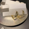 Alloy Silver Needle Geometric Twisted Hoop Earrings Trendy Light Luxury Statement Earrings for Women view 4