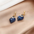 Elegant Long Diamond Shape Crystal Drop Dangle With Rhinestone Trim And Gold Alloy Stud Earrings view 4