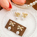 Elegant Pink Enamel Bowknot Faux Pearl Drop Clip On Alloy Korean Fashion Statement Earrings view 1