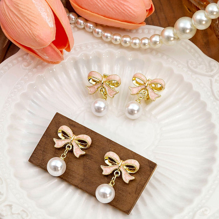 Elegant Pink Enamel Bowknot Faux Pearl Drop Clip On Alloy Korean Fashion Statement Earrings