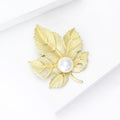 Matte Gold Alloy Pearl Leaf Brooch Simple Lapel Pin For Coats view 3