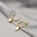 Korean Minimalist Gold Alloy Hoop Earrings With Star And Moon Charms Elegant Small Huggie Earrings view 1
