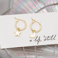 Korean Minimalist Gold Alloy Hoop Earrings With Star And Moon Charms Elegant Small Huggie Earrings view 2