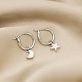 Korean Minimalist Gold Alloy Hoop Earrings With Star And Moon Charms Elegant Small Huggie Earrings view 3