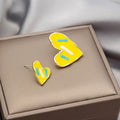 Sweet Asymmetric Heart Shape Color Contrast Enamel Alloy Studs For Women Spring Summer Earrings view 3