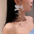Statement Alloy Pearl Rhinestone Lace Bow Long Drop Earrings With Silver Posts view 2