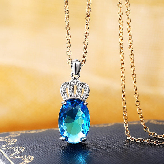 Elegant Crown Pendant Necklace For Women, Four Prong Platinum Plated Copper With Aquamarine Blue Zircon