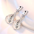 European American Silver Plated Totem Earrings With Faux Moonlight Cat Eye Stone Drops For Women view 1