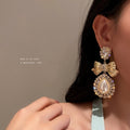 Korean Court Style Alloy Bowknot Pearl Rhinestone Water Drop Stud Earrings view 3