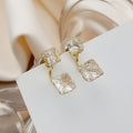 Luxury Korean Style Hollow Wrapped Zircon Crystal Ball Gold Alloy Curved Bar Stud Drop Earrings view 4