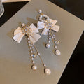 Alloy Artificial Crystal Bow Tassel Asymmetric Drop Earrings For Women Statement Light Luxury view 3