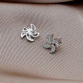 Luxury Gold Alloy Micro Paved Zircon Spinning Pinwheel Flower Stud Earrings for Women Elegant Earrings view 4