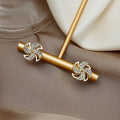 Luxury Gold Alloy Micro Paved Zircon Spinning Pinwheel Flower Stud Earrings for Women Elegant Earrings view 1