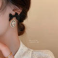 Alloy Pearl Bow Stud Earrings With Rhinestone French Vintage Fashion OL Style Ear Jewelry view 2