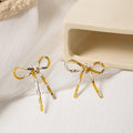 French Vintage Acrylic Bow Knot Long Tassel Asymmetric Stud Elegant Camouflage Pattern Earrings view 2