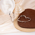 Elegant Irregular Liquid Metal Heart Hoop Stud Earrings For Women Minimalist Alloy Geometric Love Earrings view 4
