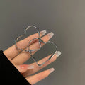 Minimalist Twisted Heart Iron Alloy Hoop Earrings With Silver Pin Cool Style Jewelry view 4