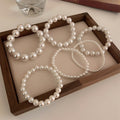 French Vintage Minimalist Pearl Elastic Bangle, Light Luxury Geometric Circle Bracelet view 1