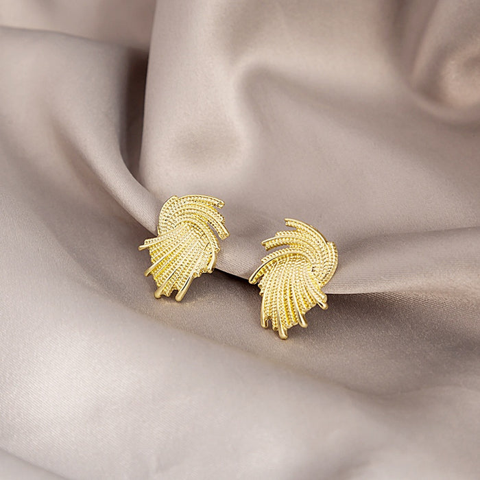 Vintage European Style Gold Alloy Woven Feather Leaf Studs With Elegant Curved Lines And Metal Texture Earrings