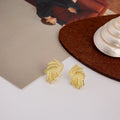 Vintage European Style Gold Alloy Woven Feather Leaf Studs With Elegant Curved Lines And Metal Texture Earrings view 3