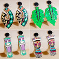 Bohemian Ethnic Hand Painted Enamel Acrylic Long Drop Totem Mask And Green Leaf Charm Earrings view 1