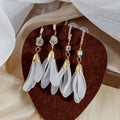 Elegant Korean White Flower Petal Tassel Drop With Cat Eye Stone Zircon Alloy Hook Dangle Earrings view 1