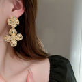 Alloy Metal Flower Stud Earrings With Silver Posts European American Minimalist Statement Design view 3